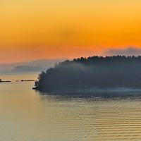Buy canvas prints of Dramatic sunrise on the Baltic Sea amid the island by Marianne Campolongo
