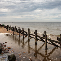 Buy canvas prints of Mesmerizing Reflections of West Runton by Wendy Williams CPAGB