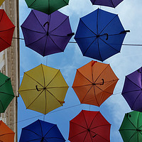 Buy canvas prints of Colorful umbrellas by Marinela Feier