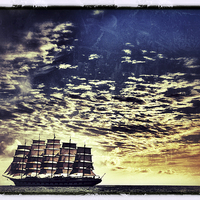 Buy canvas prints of Clipper Ship at Sunset by Scott Anderson