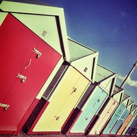 Buy canvas prints of Brighton and Hove Beach Huts by Scott Anderson