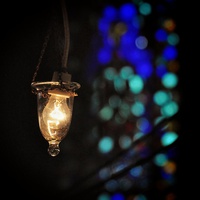 Buy canvas prints of  Light bulb and bokeh by Scott Anderson