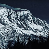 Buy canvas prints of The Grandes Jorasses from Courmayeur by Andy Armitage