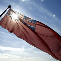 Buy canvas prints of sun through red ensign by uk crunch