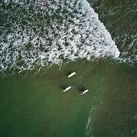 Buy canvas prints of Three go Surfing by Dan Ward