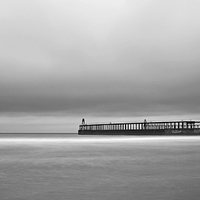 Buy canvas prints of Whitby pier long exposure by Dan Ward