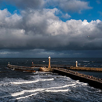 Buy canvas prints of Stormy Skies over Whitby Pier by Dan Ward