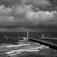 Buy canvas prints of Stormy Skies over Whitby Pier  by Dan Ward