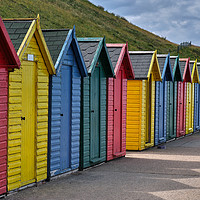 Buy canvas prints of Whitby Beach Huts by Dan Ward