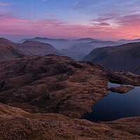 Buy canvas prints of Sunrise over Sprinkling Tarn, The Lake District by Dan Ward