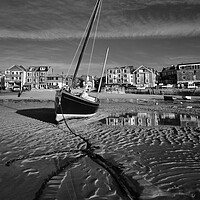 Buy canvas prints of Fishing boat catching the early morning light in St Ives harbour, Cornwall by Dan Ward