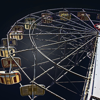 Buy canvas prints of Ferris Wheel in the Night by Tom and Dawn Gari