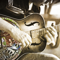 Buy canvas prints of The Guitar Player by Tom and Dawn Gari