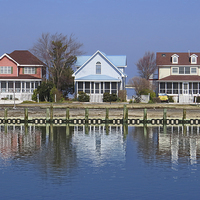 Buy canvas prints of  Houses By The Bay by Tom and Dawn Gari