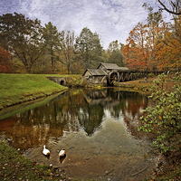 Buy canvas prints of  Reflections Of The Mill by Tom and Dawn Gari