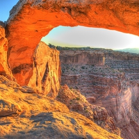 Buy canvas prints of Mesa Arch Canyon Lands by Gurinder Punn