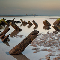 Buy canvas prints of Wreck on Bamburgh Beach by David Preston