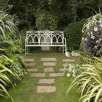Buy canvas prints of A Peaceful Seat in the White garden at Chenies  by Elizabeth Debenham
