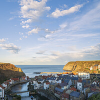 Buy canvas prints of Staithes Harbour North Yorkshire evening light by Chris Warren