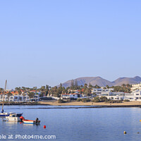 Buy canvas prints of View across the bay Corralejo Fuerteventura by Chris Warren