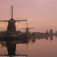 Buy canvas prints of Windmills at dawn Kinderdijk Holland by Chris Warren