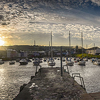 Buy canvas prints of Sun rise over Aberaeron harbour by Andrew chittock