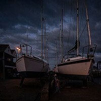 Buy canvas prints of Aberaeron harbour blue hour  by Andrew chittock