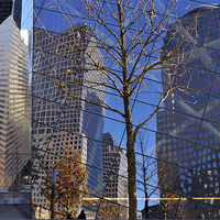 Buy canvas prints of Mirrored  skyscrapers in New York - Ground Zero by Maria Carter