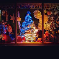 Buy canvas prints of Christmas Shop. by Victor Burnside