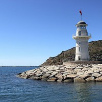Buy canvas prints of Antalya harbour lighthouse, Turkey by Robert Cane