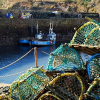 Buy canvas prints of Lobster Pots at Crail Harbour by Kenny McNab