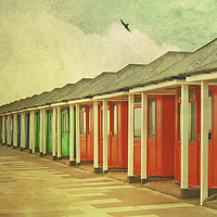 Buy canvas prints of Lincolnshire Beach Huts by Lesley Mohamad