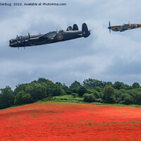 Buy canvas prints of Lancaster Bomber And Hawker Hurricane Flying Over  by rawshutterbug 
