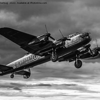 Buy canvas prints of Lancaster Bomber In The Sky Mono by rawshutterbug 