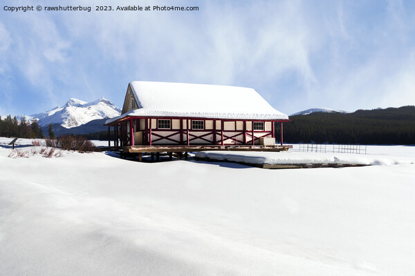 Snowy Maligne Lake Boat House Picture Board by rawshutterbug 