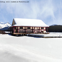 Buy canvas prints of Snowy Maligne Lake Boat House by rawshutterbug 