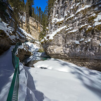 Buy canvas prints of Snowy Johnston Creek (Alberta) by rawshutterbug 
