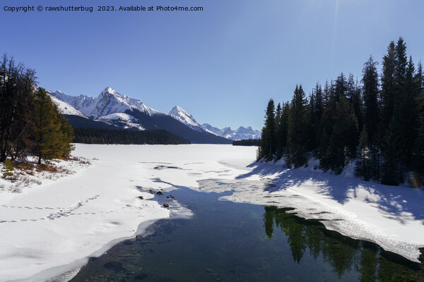 Snowy Maligne Lake Amidst White Peaks Picture Board by rawshutterbug 