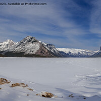 Buy canvas prints of Snow-kissed Lake Minnewanka Panorama by rawshutterbug 