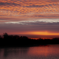 Buy canvas prints of Red Sky At Chasewater by rawshutterbug 