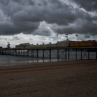 Buy canvas prints of Dark Clouds Over Paignton Pier by rawshutterbug 