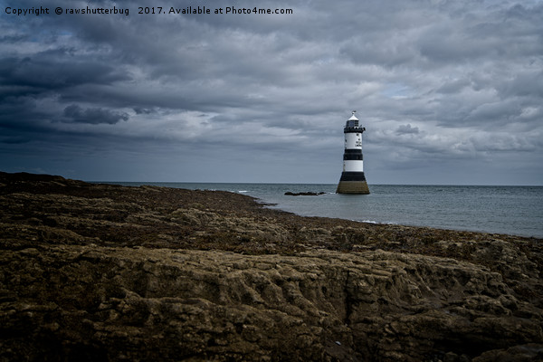 Storm Clouds Over The Trwyn Du Lighthouse Picture Board by rawshutterbug 
