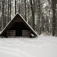 Buy canvas prints of Log Hut In The Snow by rawshutterbug 