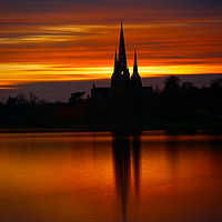 Buy canvas prints of Fiery Sunset Reflection At The Lichfield Cathedral by rawshutterbug 