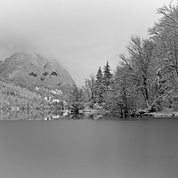 Buy canvas prints of Partly Frozen Lake Bohinj Mono by rawshutterbug 