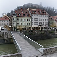 Buy canvas prints of Ljubljana Castle In The Fog by rawshutterbug 