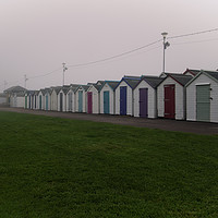 Buy canvas prints of Beach Huts On A Foggy Morning by rawshutterbug 