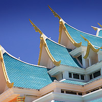 Buy canvas prints of The roof of Wat Pa Phu kon  by Jim O'Donnell