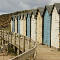 Buy canvas prints of  Beach huts in Bude, Cornwall by Matthew Silver