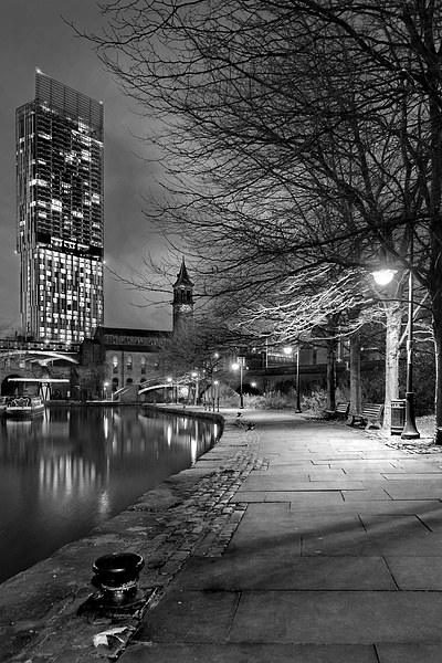 Manchester By Night. Framed Print by Garry Smith